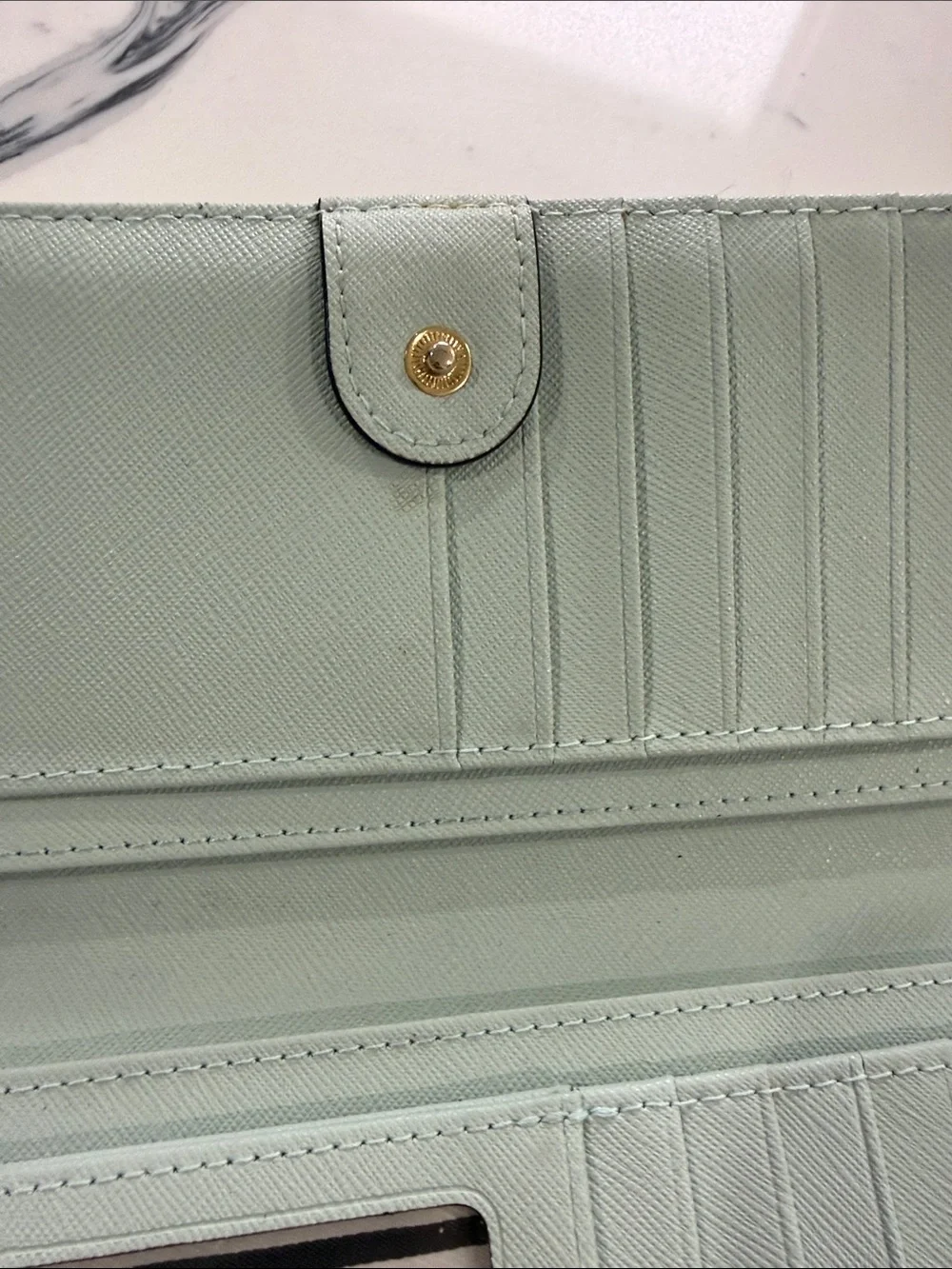 kate spade mint green wallet with gold logo